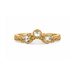 Crafted in 14KT yellow gold, this ring has a curve featuring 3 rose-cut diamonds in a row on a vintage-inspired hand engraved band.
