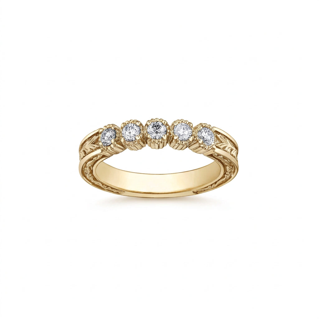 Crafted in 18KT Canadian Certified Gold, this frost-inspired hand engraved band is set with five round brilliant-cut Canadian diamonds.
