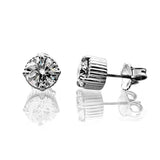 Pair of lab-grown diamond stud earrings on a white background
