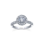 Crafted in 18KT Certified Canadian Gold, this ring features a diamond set band and halo with a round brilliant-cut Canadian centre diamond and hidden maple leaf details.