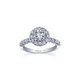 Crafted in 18KT Certified Canadian Gold, this ring features a diamond set band and halo with a round brilliant-cut Canadian centre diamond and hidden maple leaf details.
