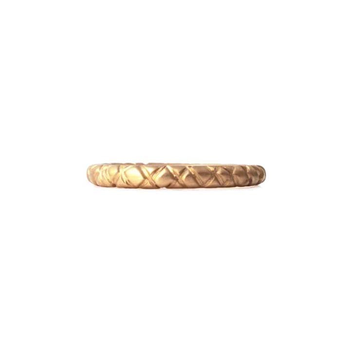 Quilted band crafted in 14KT yellow gold. 