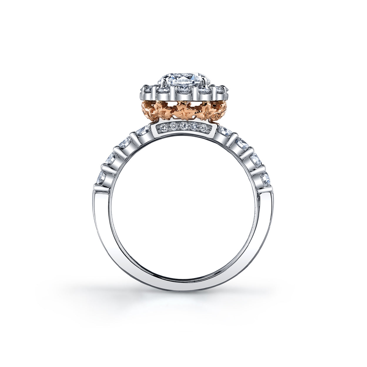 Crafted in 18KT rose and white Certified Canadian Gold, this ring features a diamond set band and halo with a round brilliant-cut Canadian centre diamond and hidden maple leaf details.
