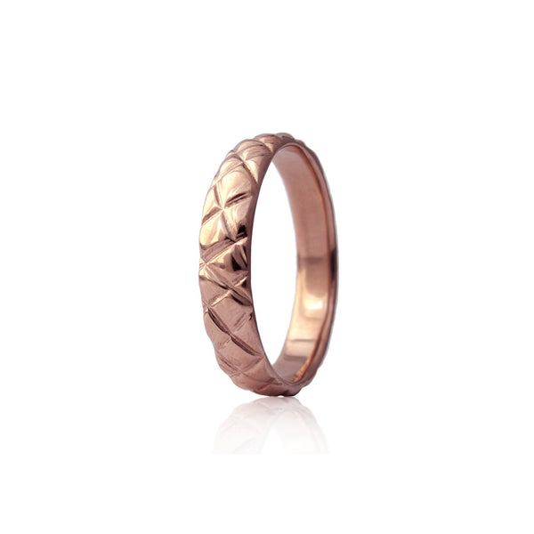 4.5mm quilted band crafted in 14KT rose gold. 