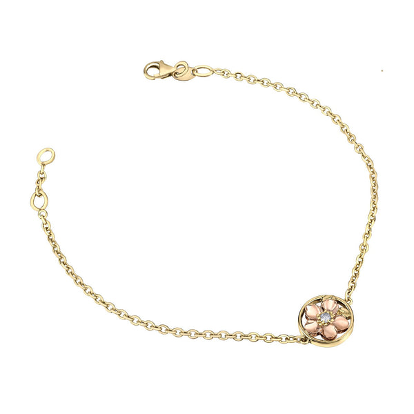 Crafted in 14KT rose and yellow Certified Canadian Gold, this bracelet features an Alberta wild roses set with a round brilliant-cut Canadian diamond