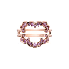 Crafted in 14KT Canadian Certified Gold, this ladies engagement ring features a large circle like shape set with pink sapphires. 
