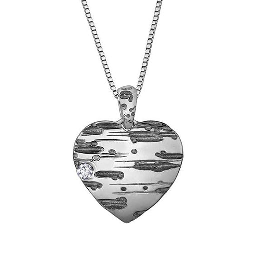 Crafted in 14KT Certified Canadian Gold, this heart shape pendant features a birch bark pattern with black rhodium details and a round brilliant-cut Canadian diamond. 