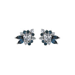 Crafted in 14KT Canadian Certified Gold these diamond earrings feature a wildflower-inspired shape set with round brilliant cut Canadian diamonds and blue sapphire.