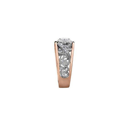 Crafted in 18kt Pure White™ and rose 18KT Certified Canadian Gold, this engagement ring features a diamond set rose vine design with an oval-cut Canadian centre diamond.