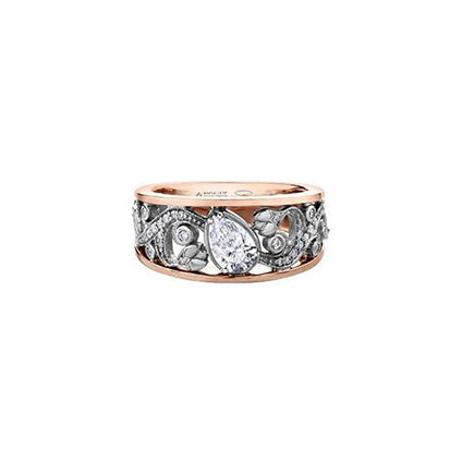 Crafted in 18kt Pure White™ and rose 18KT Certified Canadian Gold, this engagement ring features a diamond set rose vine design with a tilted pear shape Canadian centre diamond.
