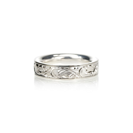 Crafted in 14KT white gold, this flat comfort-fit band is hand-engraved with a paisley design. 