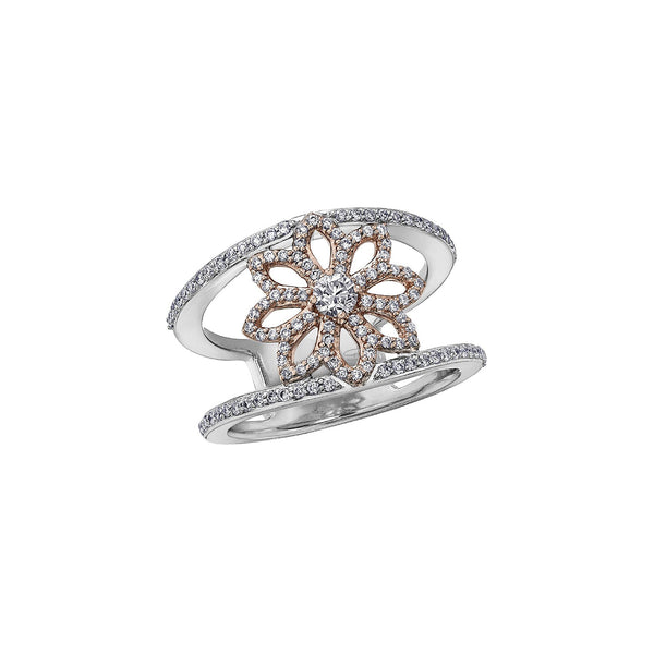 Band and petals are pavé set with diamonds.