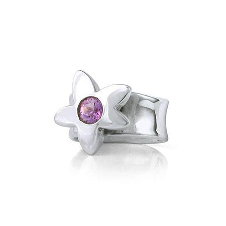 Crafted in sterling silver, this ring features a large flower with an amethyst centre.
