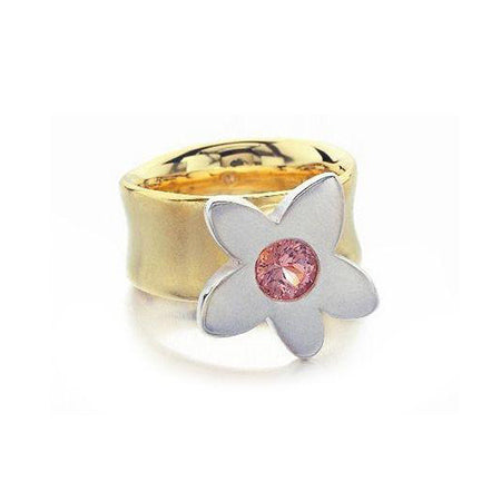 Crafted in 14KT yellow and white gold, this ring features a large flower with a pink sapphire centre. 