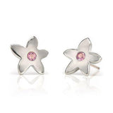 Crafted in 14KT white gold, these stud earrings each feature a flower with a pink sapphire centre. 
