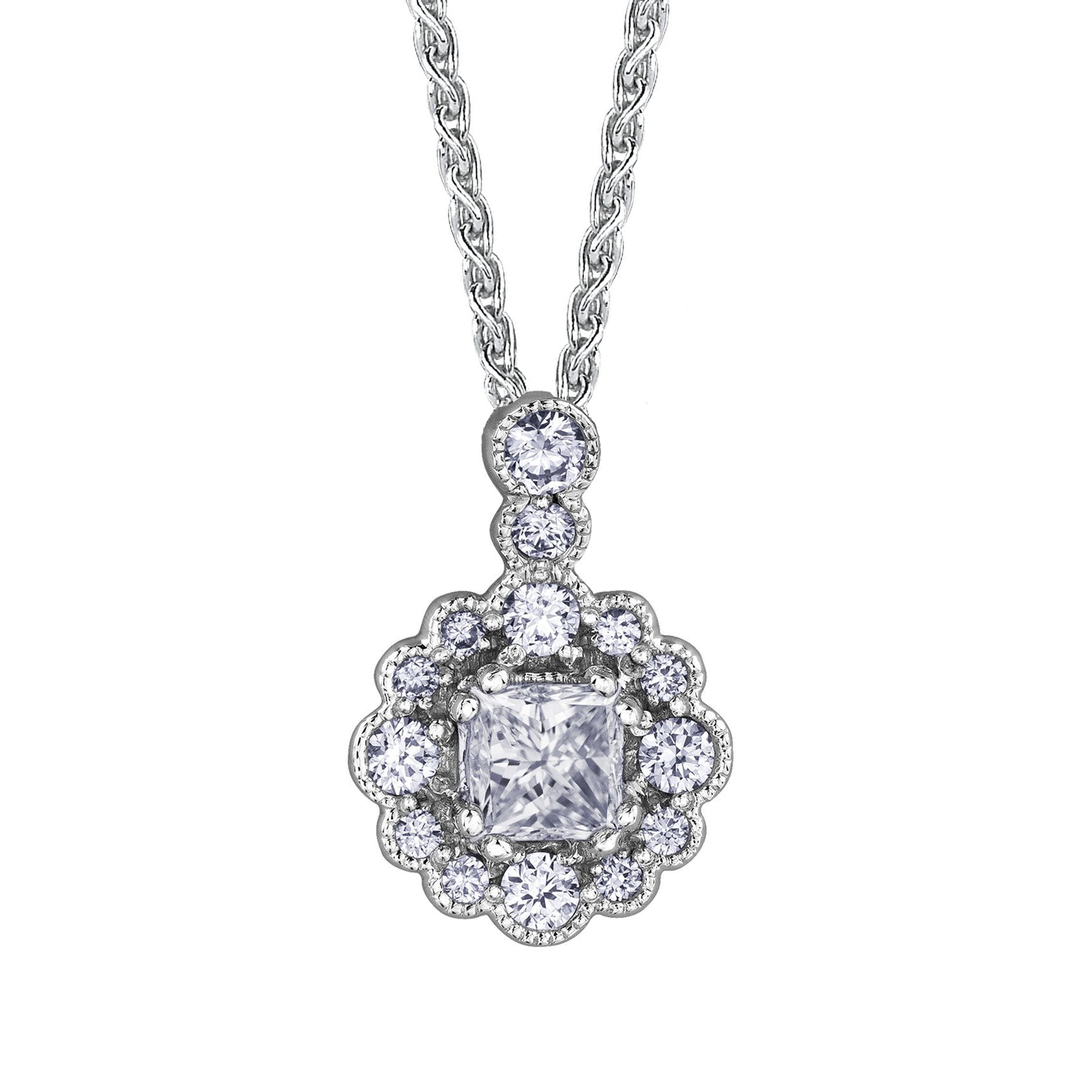 Crafted in 14KT white Certified Canadian Gold, this pendant features a diamond-set snowflake halo with a princess-cut Canadian centre diamond and a diamond-set bail. 