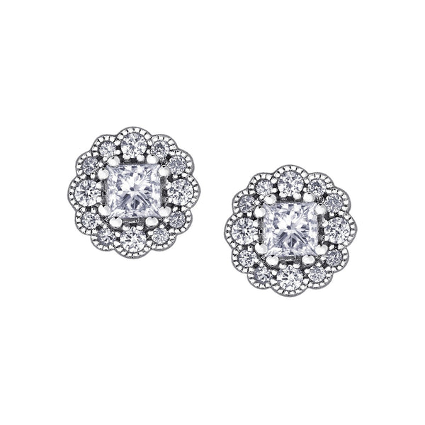 Crafted in 18KT white Certified Canadian Gold, these stud earrings feature diamond-set snowflake halos with princess-cut Canadian diamonds. 
