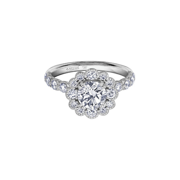  Crafted in 18KT white Certified Canadian Gold, this engagement ring features a diamond-set snowflake halo with a round brilliant-cut Canadian centre diamond on a diamond-set band. 