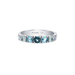 Crafted in 14KT white Certified Canadian Gold, this ring is set with blue topaz and round brilliant-cut Canadian diamonds.
