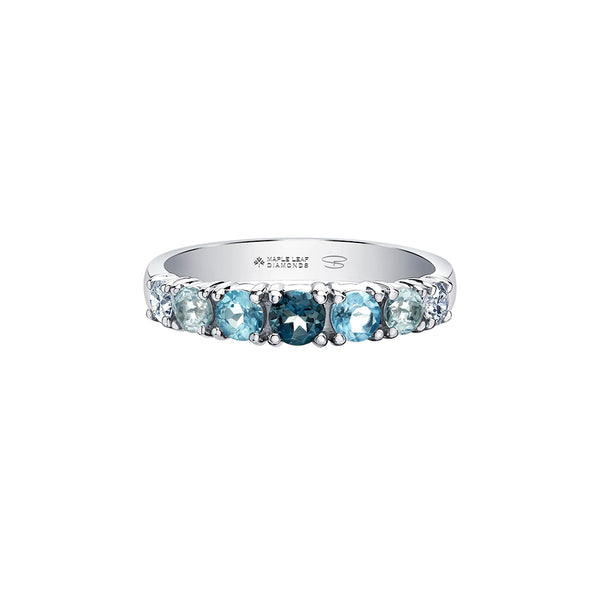 Crafted in 14KT white Certified Canadian Gold, this ring is set with blue topaz and round brilliant-cut Canadian diamonds.