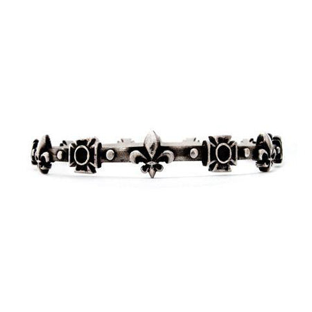 Crafted in oxidized sterling silver this bangle bracelet features Fleur de Lys all around the band. 