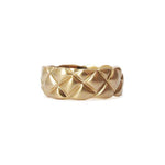 7mm quilted band crafted in 14KT yellow gold. 