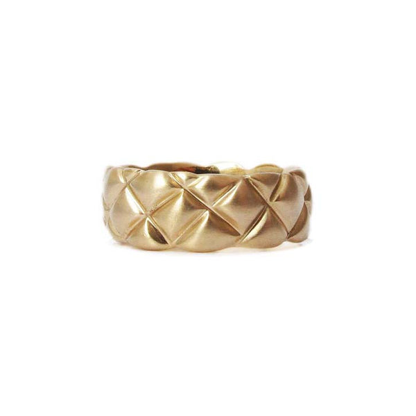 7mm quilted band crafted in 14KT yellow gold. 