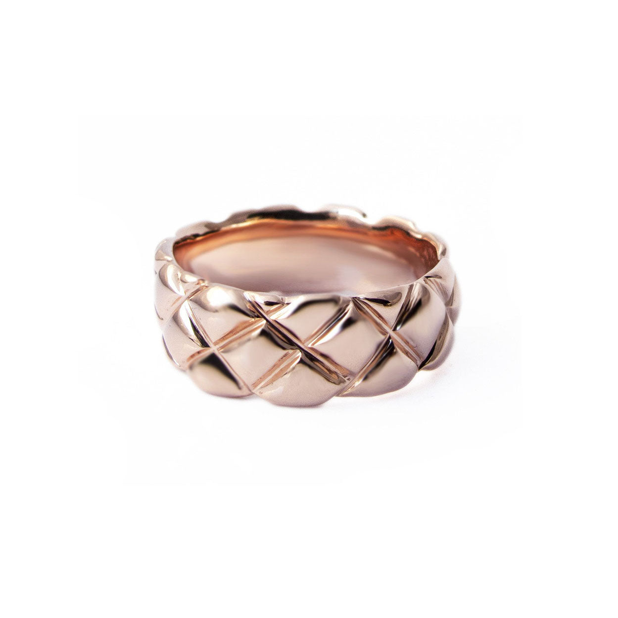 7mm quilted band crafted in 14KT rose gold. 