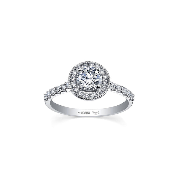 Crafted in 18KT Certified Canadian Gold, this ring features a diamond set halo with a round brilliant-cut Canadian centre  diamond on a diamond set band. 