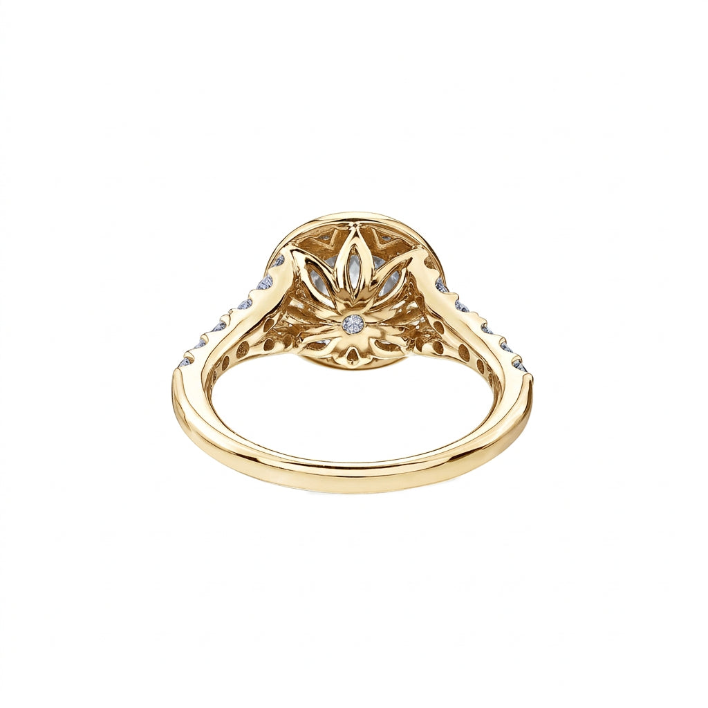 Crafted in 18KT Certified Canadian Gold, this water lily flower-inspired filigree ring features round-cut Canadian diamonds.
