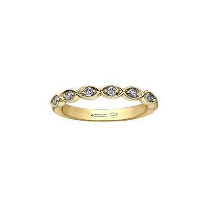 Crafted in 18KT yellow gold, this lily of the valley flower-inspired band is set with Canadian diamonds. 