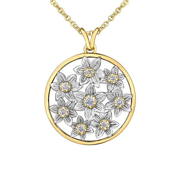 Crafted in 14KT white and yellow Certified Canadian Gold, this pendant features Manitoba prairie crocus flowers set with round brilliant-cut Canadian diamonds
