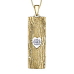 Crafted in 14KT yellow Canadian Certified Gold, this necklace features a tree bark-inspired pendant with a heart-shaped cut out filled with a round brilliant-cut Canadian diamond. 