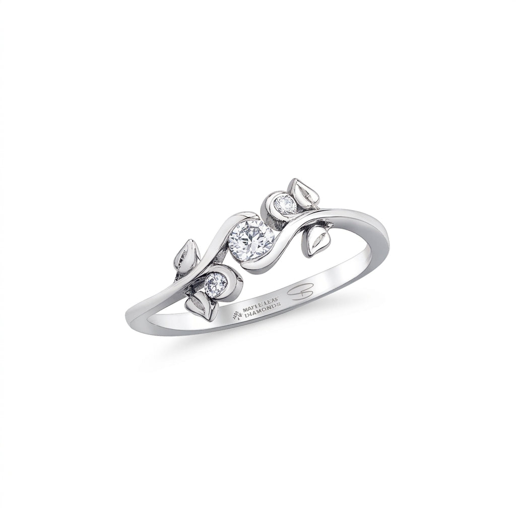 Crafted in 14KT Canadian Certified Gold, this engagement ring features a vine set with three round brilliant-cut Canadian diamonds.