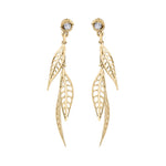 willow dangle earrings Crafted in 14KT yellow Canadian Certified Gold, these earrings feature three willow tree leaves dangling from studs each set with a round brilliant-cut Canadian Diamond