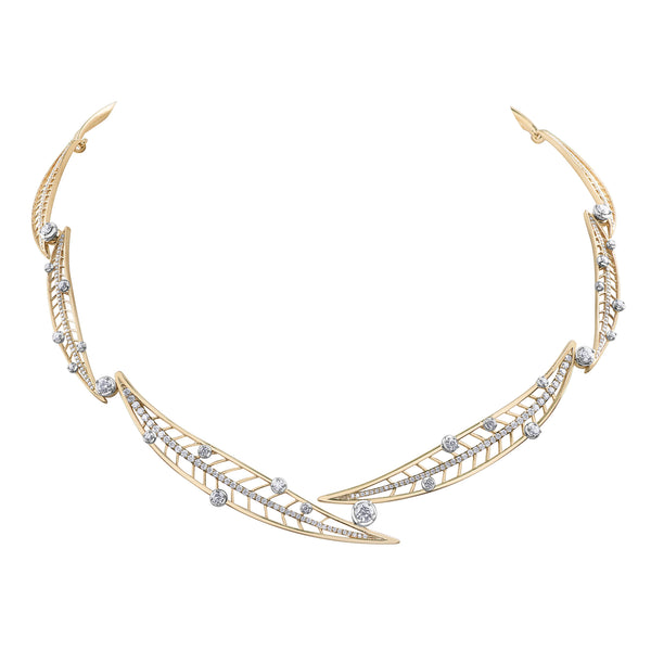 Crafted in 14KT Canadian Certified Gold, this necklace  features willow tree leaves linked together set with round brilliant-cut Canadian Diamonds. 