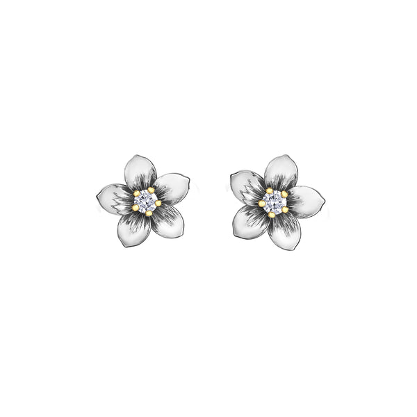 Crafted in 14KT yellow and white Certified Canadian Gold, these earrings feature Nova Scotia mayflowers set with round brilliant-cut Canadian diamonds