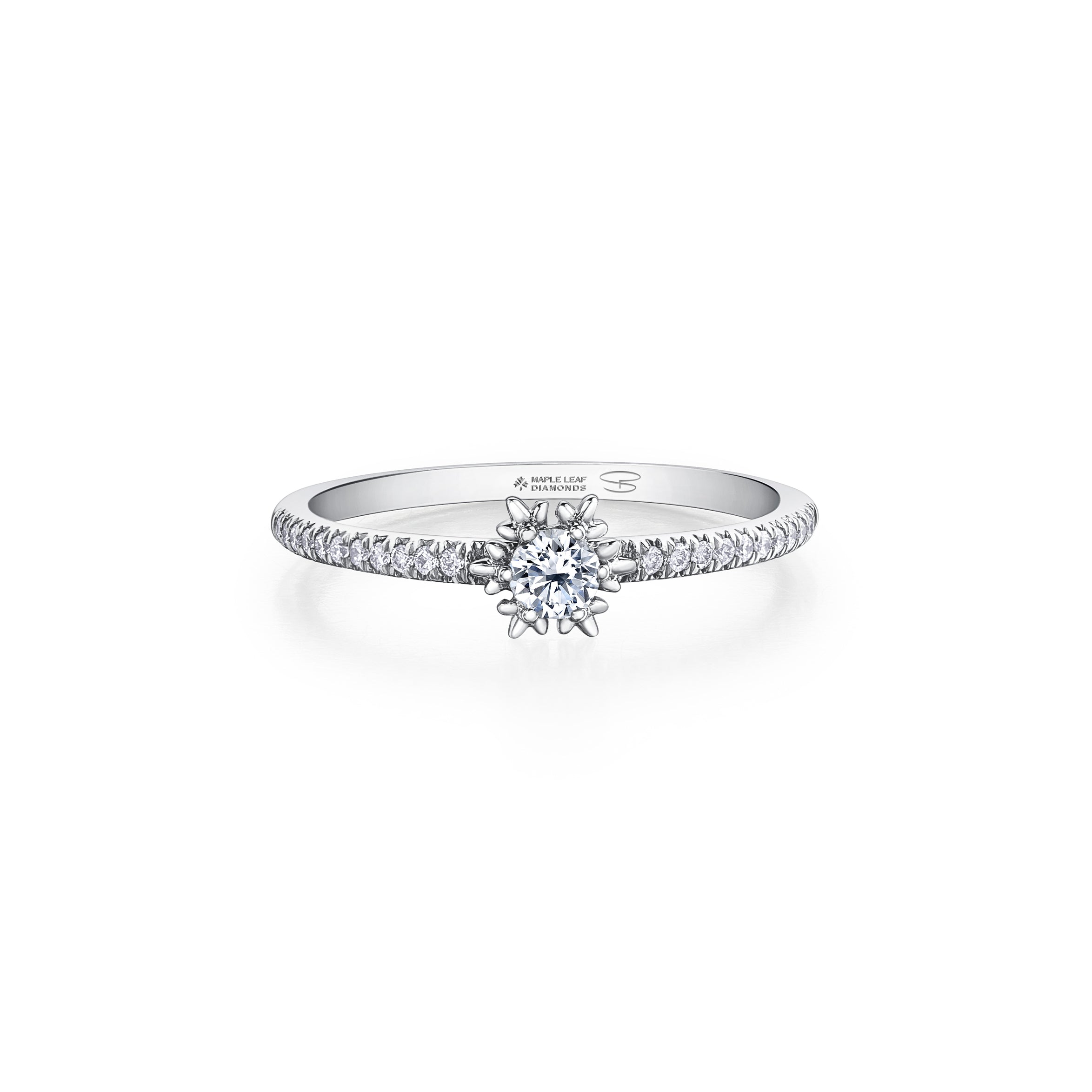 Crafted in 14KT white Certified Canadian Gold, this ring features a snowflake set with a round brilliant-cut Canadian diamond on a diamond set band. 
