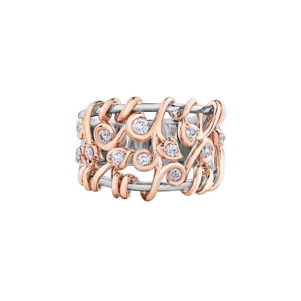 This ring features round brilliant-cut Canadian diamond set vines crafted from 14KT rose Canadian Certified Gold wrapped around two thin 14KT white Canadian Certified Gold bands. 