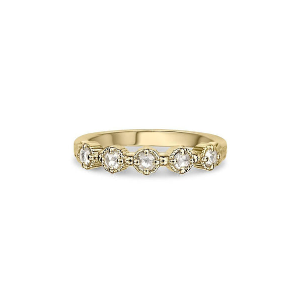 Crafted in 14KT yellow gold, this ring features five rose-cut diamonds in cupcake settings on a vintage-inspired hand engraved band. 