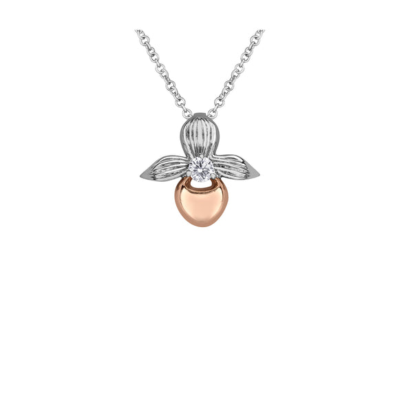 Crafted in 14KT rose and white Certified Canadian Gold, this necklace features a Prince Edward Island lady's slipper flower set with a round brilliant-cut Canadian diamond