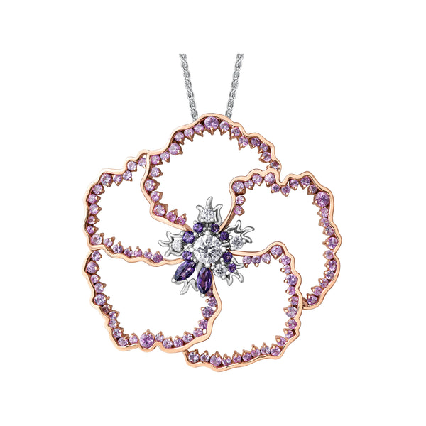 Crafted in 14KT white and rose Certified Canadian Gold, this pendant features a large wildflower set with round brilliant-cut Canadian diamonds, amethyst and pink sapphires.