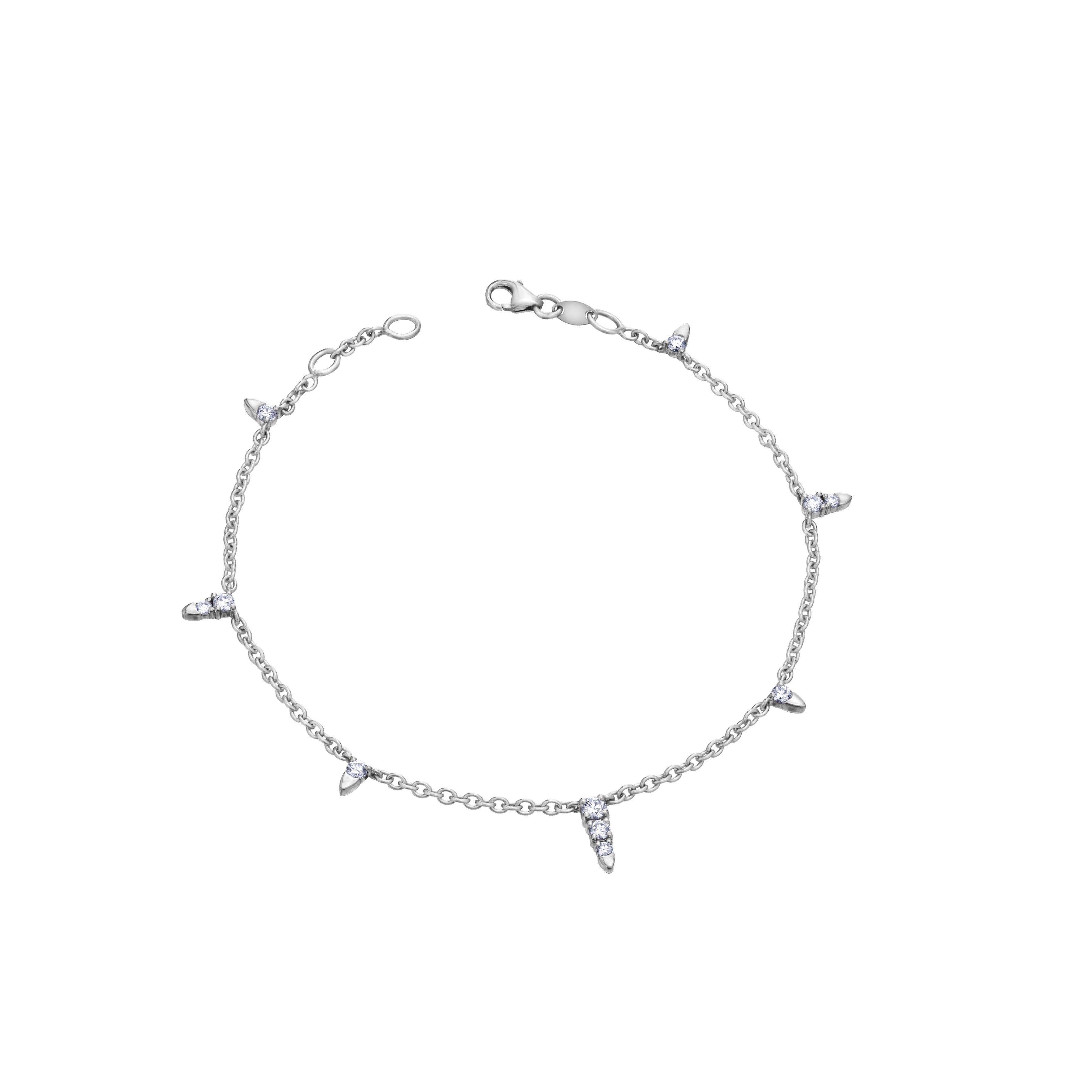 Crafted in 14KT white Certified Canadian Gold, this bracelet features baby icicles set with round brilliant-cut Canadian diamonds.