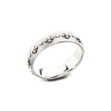 Crafted in 14KT white gold, this ring is embossed with Fleur de Lys all around the band.