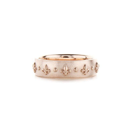 Crafted in 14KT rose gold, this ring is embossed with Fleur de Lys all around the band.