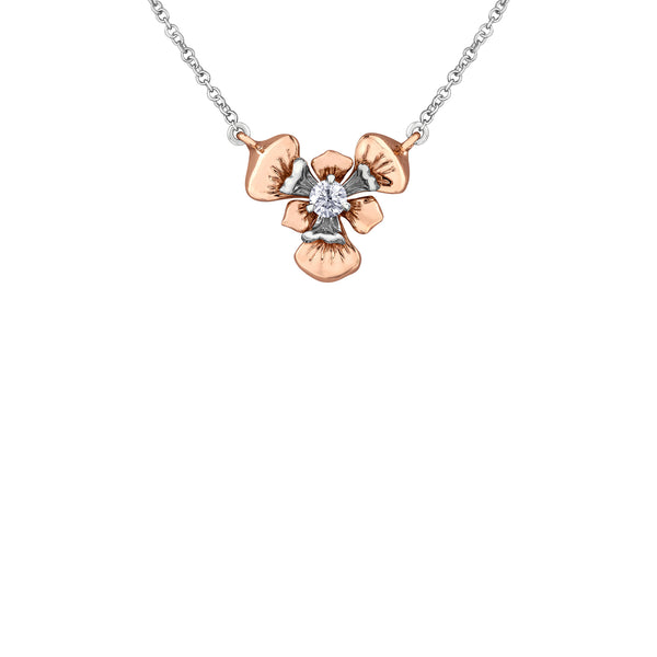 Crafted in 14KT rose and white Certified Canadian Gold, this necklace features a Quebec blue flag iris flower set with a round brilliant-cut Canadian diamond