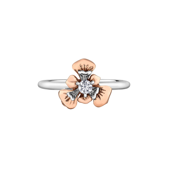 Crafted in 14KT rose and white Certified Canadian Gold, this ring features a Quebec blue flag iris flower set with a round brilliant-cut Canadian diamond