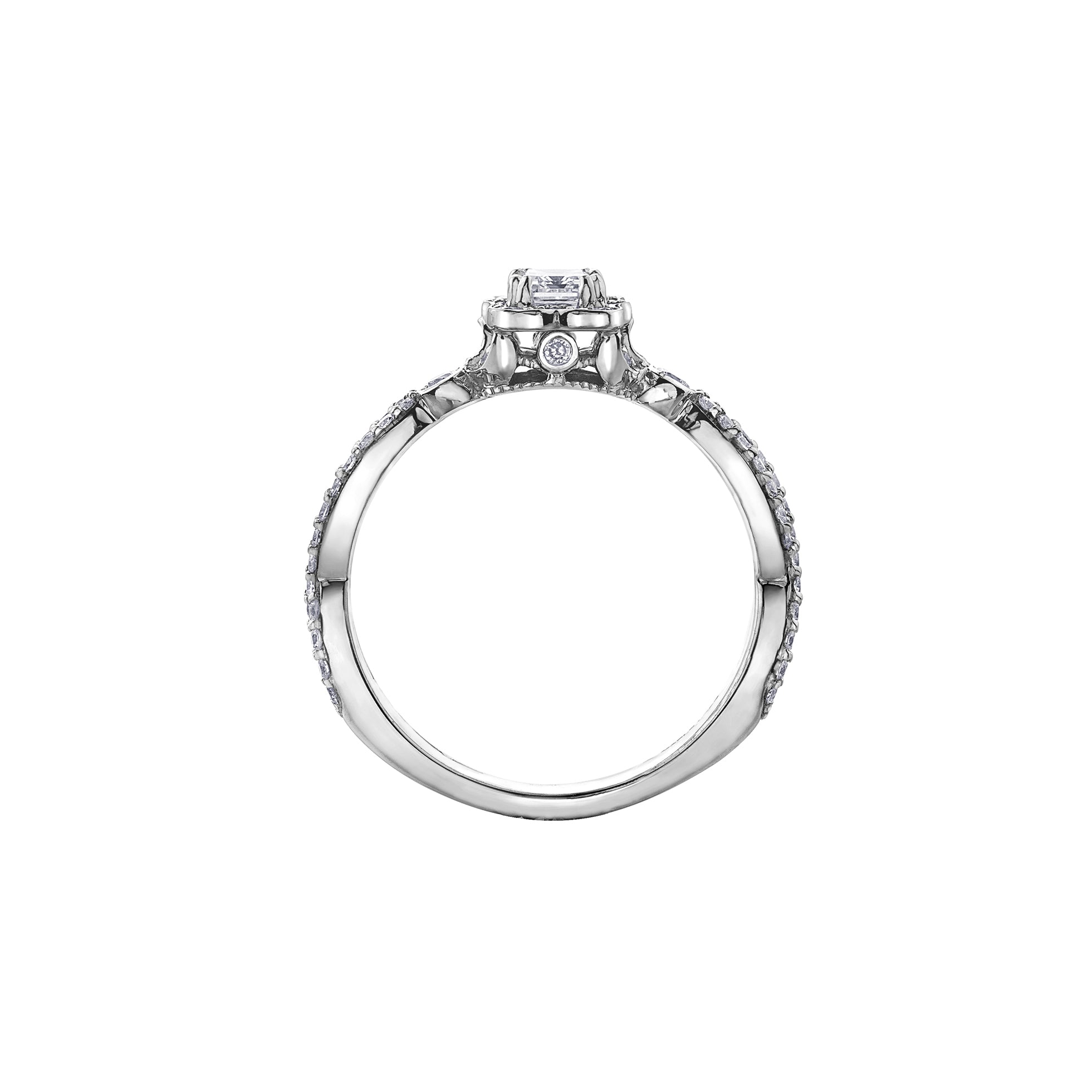 Crafted in 18kt Pure White™, this engagement ring features a diamond set emerald-shaped halo with an emerald-cut Canadian centre diamond. All on a diamond set infinity symbol-inspired band.  