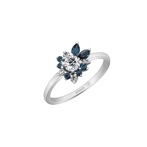 Crafted in 14KT Canadian Certified Gold, this diamond ring features a wildflower-inspired shape set with round brilliant cut Canadian diamonds and blue sapphires.