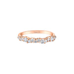 Crafted in rose 14KT Canadian Certified Gold, this ring features fourteen round brilliant cut Canadian diamonds